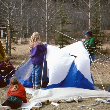 Girl guides raising tent